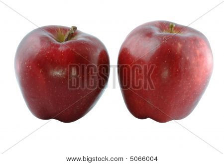 Twee rijpe rode appels op een lichte achtergrond