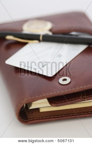 Kreditní carda pero a hodinky