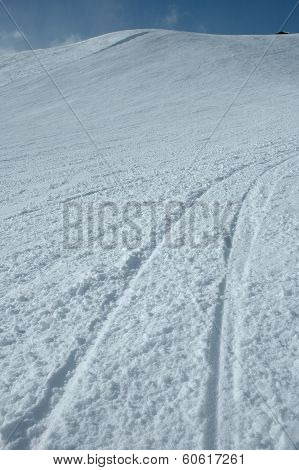 Ski Tracks On Slope