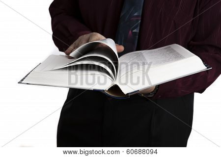 Man Holding An Open Book