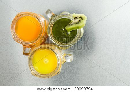 Three Jugs Of Fresh Tropical Fruit Juice