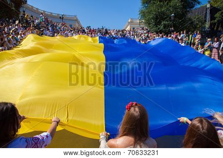 ODESSA, UKRAINE - August 23: Flash mob in city of Odessa on Potemkin Stairs on August 23, 2014, in day of a national flag of Ukraine.
