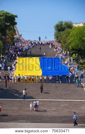 ODESSA, UKRAINE - August 23: Flash mob in city of Odessa on Potemkin Stairs on August 23, 2014, in day of a national flag of Ukraine.