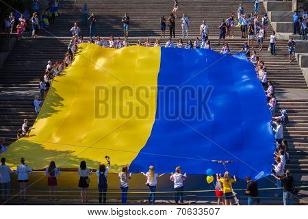 ODESSA, UKRAINE - August 23: Flash mob in city of Odessa on Potemkin Stairs on August 23, 2014, in day of a national flag of Ukraine.