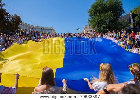 ODESSA, UKRAINE - August 23: Flash mob in city of Odessa on Potemkin Stairs on August 23, 2014, in day of a national flag of Ukraine.