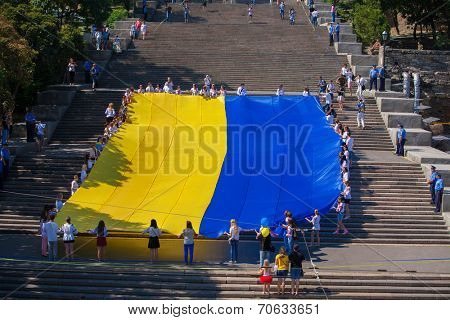 ODESSA, UKRAINE - August 23: Flash mob in city of Odessa on Potemkin Stairs on August 23, 2014, in day of a national flag of Ukraine.