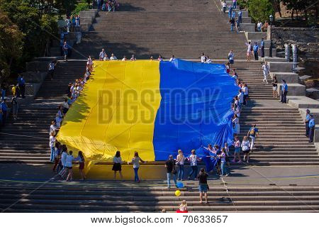 ODESSA, UKRAINE - August 23: Flash mob in city of Odessa on Potemkin Stairs on August 23, 2014, in day of a national flag of Ukraine.
