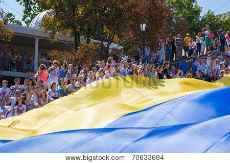 ODESSA, UKRAINE - August 23: Flash mob in city of Odessa on Potemkin Stairs on August 23, 2014, in day of a national flag of Ukraine.