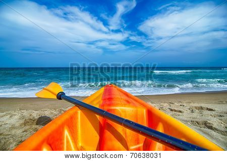 Kayak Looking At The Beach And Ocean Waves