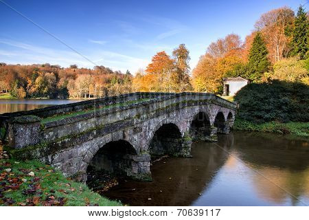 Bridge Over Main Lake In Stourhead Gardens During Autumn.