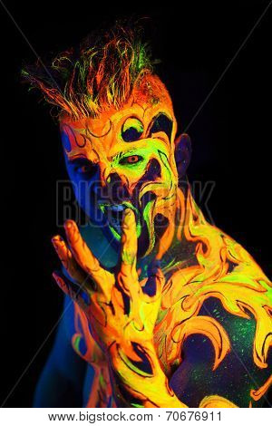 Body art glowing in ultraviolet light -  Fire 