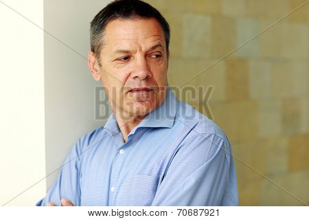 Portrait of a senior man looking away