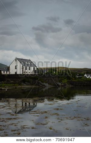 House reflected in the bay