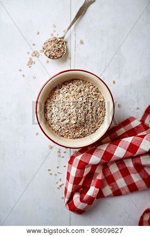Organic rye flakes in a bowl 