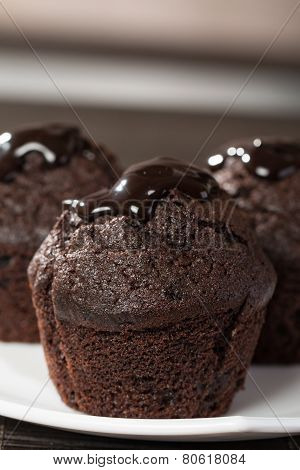 Spongecake Or Muffin With Chocolate Sauce