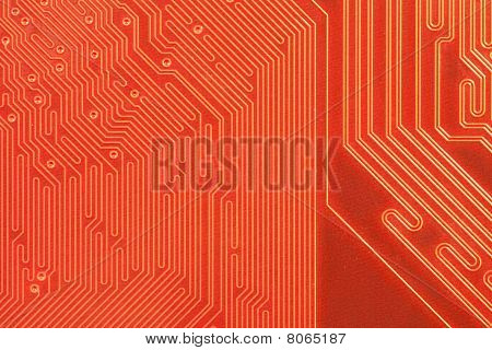 Closeup Of Computer Circuit Board In Orange