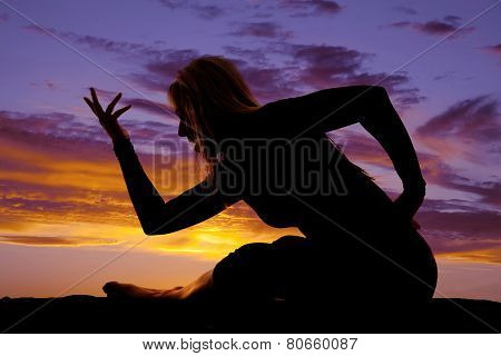 Silouette Of A Woman Sitting Lean Forward Hand Up Fingers Out