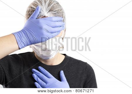 Anguished Doctor Covering Her Face With Her Hands, Isolated On White