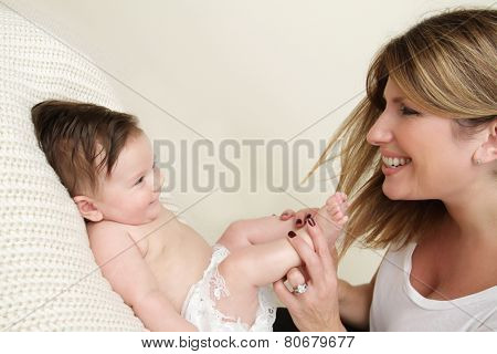 Mother Playing With Baby