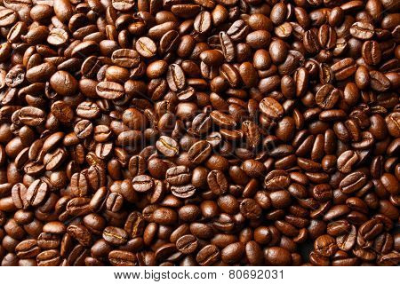 Roasted coffee beans texture background.
