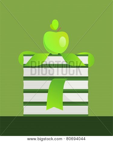 Green apple and books stack