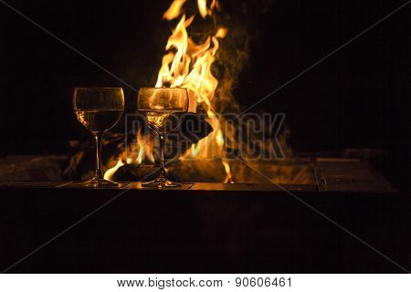 Two Wine Glasses Fire