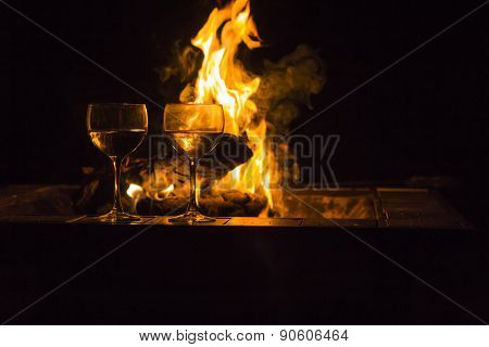 Two Wine Glasses Fire