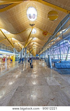 Passengers Walk By At The New Terminal T4 At Barajas Airport