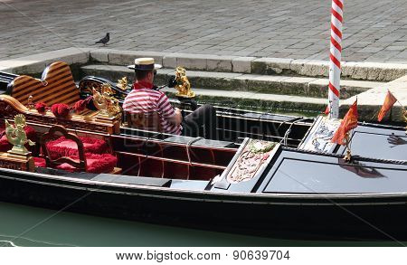 Gondolier resting in Venice