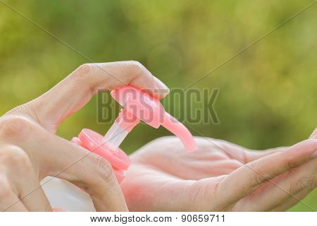 Female Hands Applying Liquid Soap Close Up