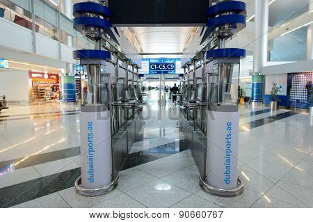 DUBAI, UAE - MARCH 10, 2015: DXB airport interior. Dubai International Airport is an international airport serving Dubai. It is a major airline hub in the Middle East, and is the main airport of Dubai