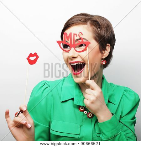 Attractive playful young woman ready for party - falce lips and glasses  