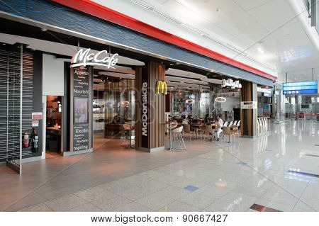 DUBAI, UAE - MARCH 10, 2015: DXB airport interior. Dubai International Airport is the primary airport serving Dubai, and is the world's busiest airport by international passenger traffic.