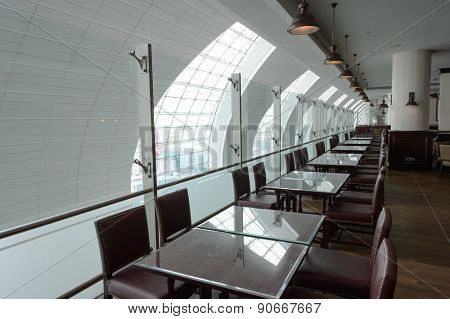 DUBAI, UAE - MARCH 10, 2015: DXB airport interior. Dubai International Airport is the primary airport serving Dubai, and is the world's busiest airport by international passenger traffic.