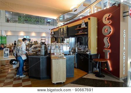 DUBAI, UAE - MARCH 10, 2015: DXB airport interior. Dubai International Airport is the primary airport serving Dubai, and is the world's busiest airport by international passenger traffic.