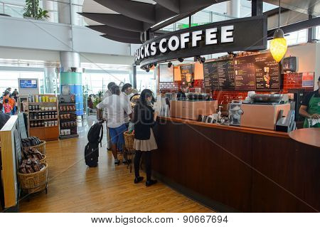 DUBAI, UAE - MARCH 10, 2015: DXB airport interior. Dubai International Airport is the primary airport serving Dubai, and is the world's busiest airport by international passenger traffic.