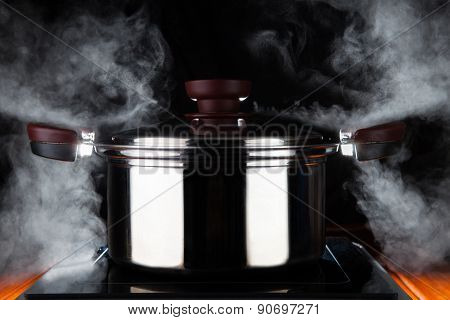 Cooking Food With Hot Stream Power Of Stanless Steel Pot On Electric Magnet Stove Use For Kitchen An
