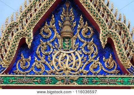 Traditional Thai style Stucco & Naga, Wood Carving Tympanum of Thai Roof Temple