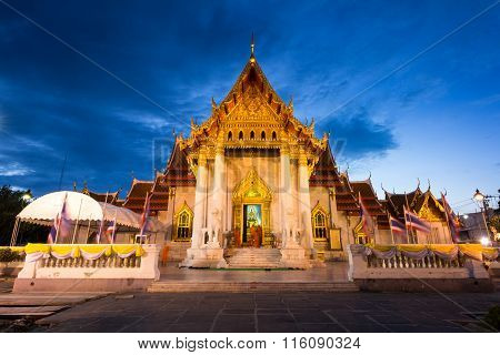 BangkokThailand-July 312015:Buddhist monk pray in the evening at Marble Temple Wat Benchamabopit Dusitvanaram in Bangkok Thailand