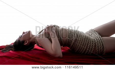Woman tied in style of Japanese bondage