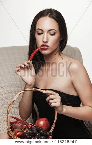 Sexy Woman Eating Fruits