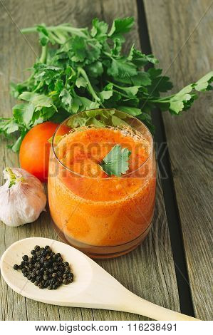 Glass Of Gaspacho On Wooden Table