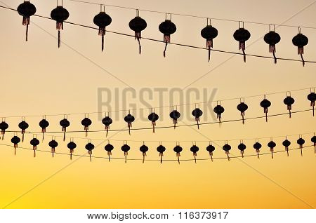 Silhouettes Of Chinese Lanterns During Sunset