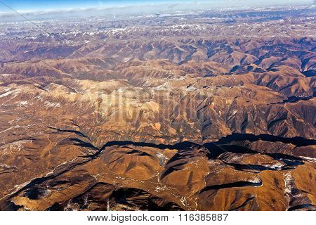 View From The Aircraft To The Mountains Of The Himalaya On Chinese Tibetan Side Snow