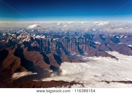 Beautiful View From The Aircraft To The Mountains Of The Himalaya On Chinese Tibetan Side Snow