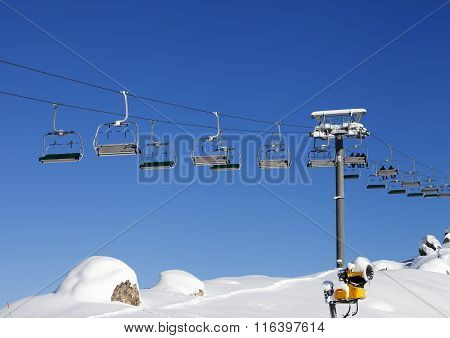Chair-lift At Ski Resort At Sun Day After Snowfall