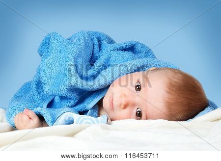 Cute baby in a towel