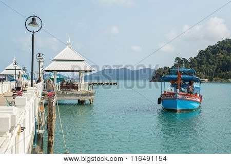 KOH CHANG, THAILAND - JAN 30, 2016: Tourist boat at the pier in Bang Bao fishing village (most touristic on the Island) From the pier of Bang Bao daily boats for excursions (500-1000 baht per person).