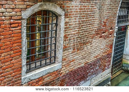 Old Wndow In A Brick Wall In Venice