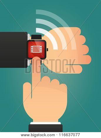 Hand Pointing A Smart Watch With A Film Photogram